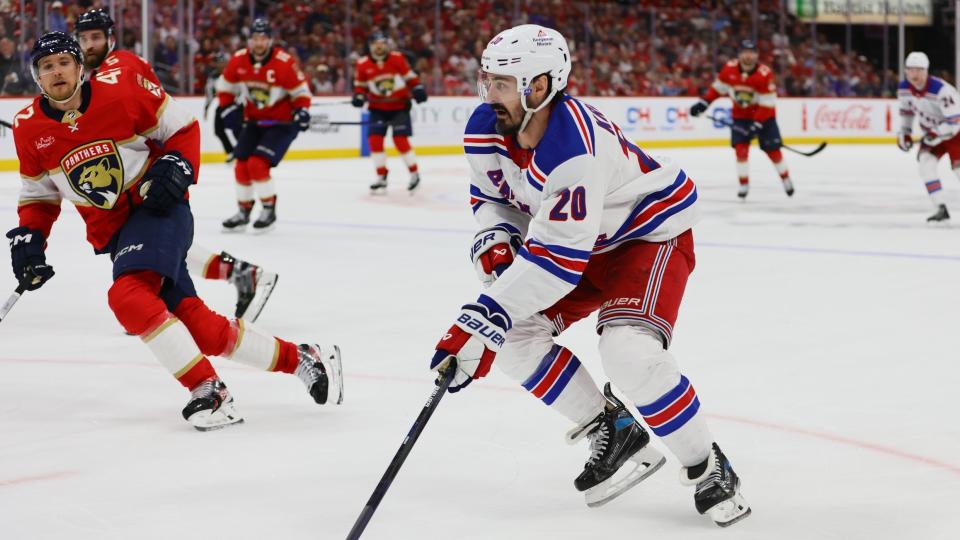 New York Rangers left wing Chris Kreider (20) moves the puck against the Florida Panthers during the third period of game four of the Eastern Conference Final of the 2024 Stanley Cup Playoffs at Amerant Bank Arena.