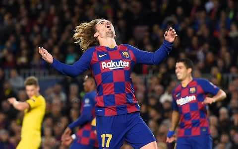 Barcelona's French forward Antoine Griezmann reacts after a goal during the UEFA Champions League Group F football match between FC Barcelona and Borussia Dortmund - Credit: &nbsp;JOSEP LAGO/AFP via Getty Images