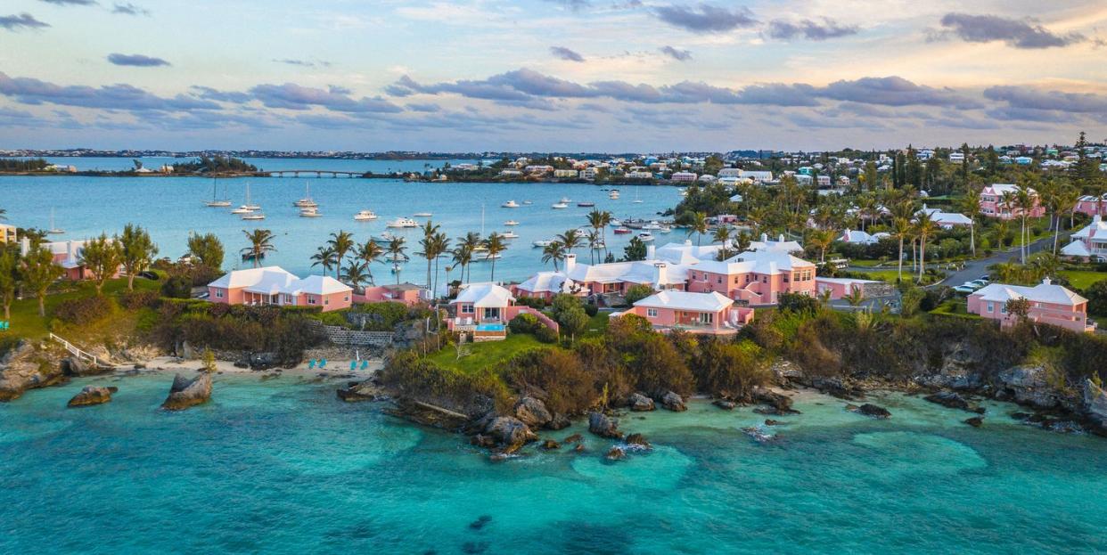 a tropical island with yachts and houses in bermuda