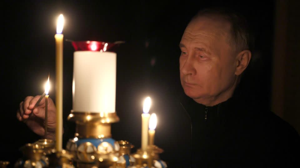 Putin lit a candle at his residence outside Moscow. He's vowed to punish the perpetrators. - Kremlin