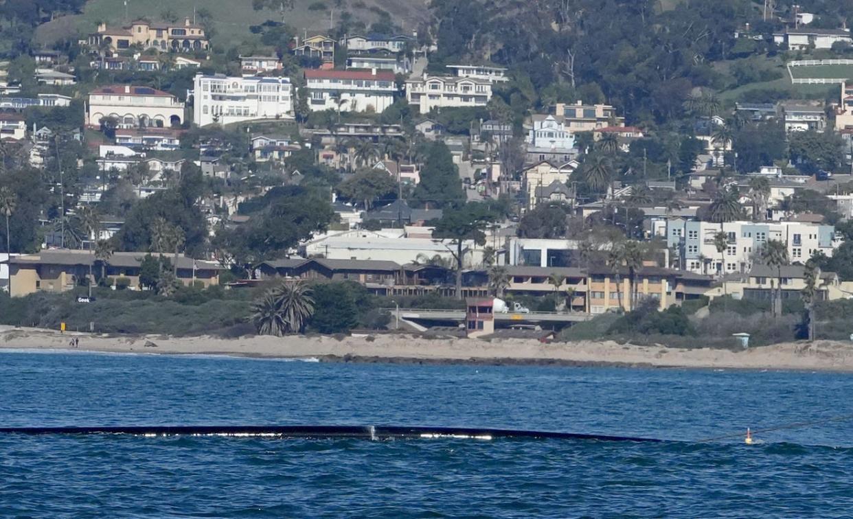 A black pipeline floats in the ocean near Marina Park during installation of an ocean outfall project in January. The Ventura City Council on Tuesday could approve spending millions for design of a water treatment facility as part of the city's  VenturaWaterPure program.