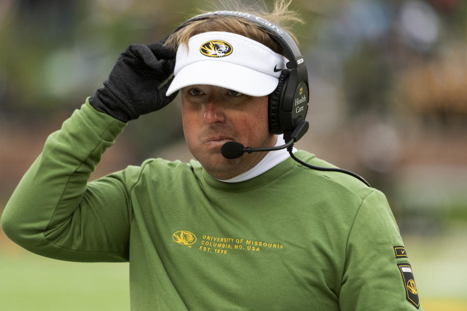 Missouri head coach Eliah Drinkwitz walks to the sideline during the second quarter of an NCAA college football game against Kentucky, Saturday, Nov. 5, 2022, in Columbia, Mo. (AP Photo/L.G. Patterson)