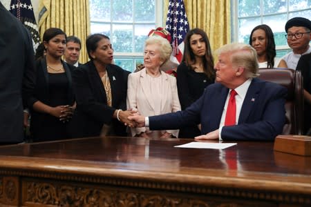 U.S. President Trump meets with victims of religious persecution at the White House in Washington