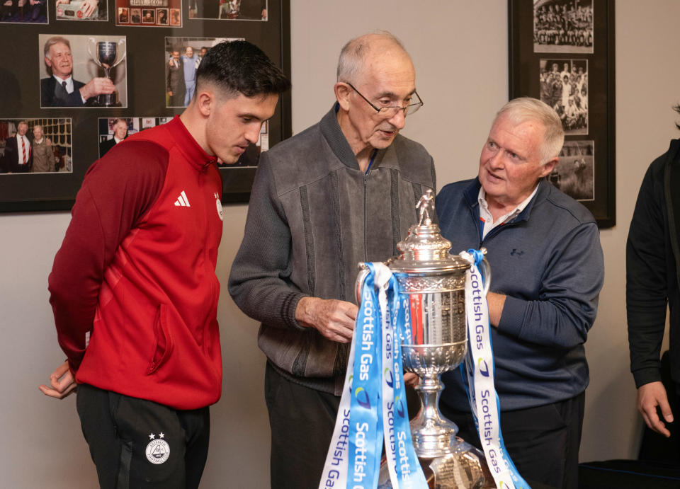 Jamie McGrath and Joe Harper at a Scottish Gas Scottish Cup and Football Memories Scotland event at Pittodrie Stadium, on April 15, 2024, in Aberdeen, Scotland. (Photo by Paul Devlin / SNS Group)