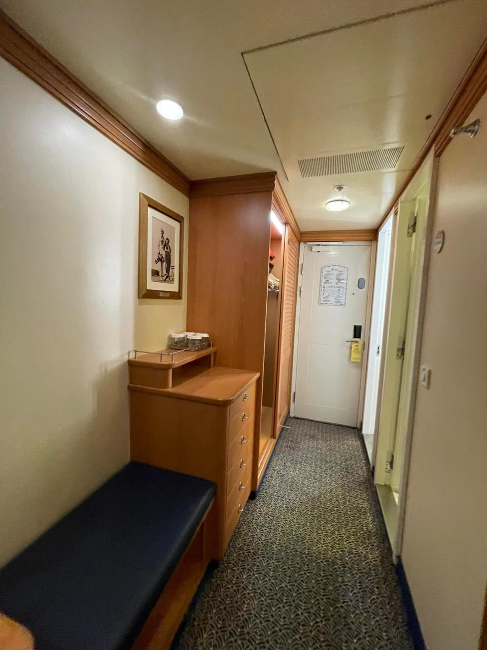 storage options in a deluxe inside stateroom on a disney magic cruise ship