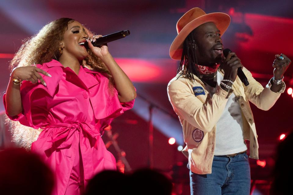 Mickey Guyton performs with Eric Burton of The Black Pumas as the two collaborate for CMT Crossroads at The Factory Tuesday, April 26, 2022, in Franklin, Tenn. 