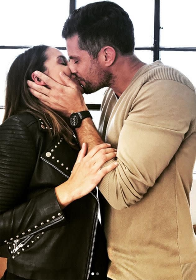 Sam kisses his finace Snez. The pair have been incredibly open about their pregnancy journey on their social media accounts. Source: Instagram