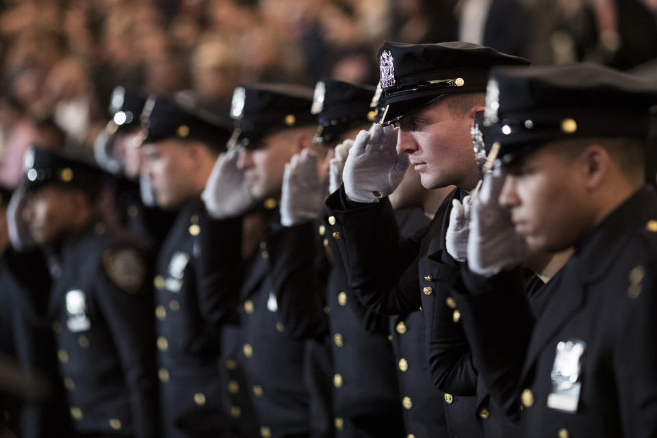 New NYPD graduates snap salutes