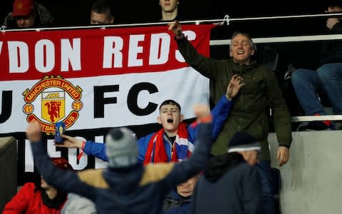 Manchester United fans before the match - Credit: REUTERS