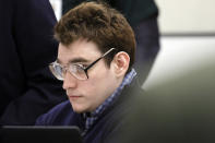 Marjory Stoneman Douglas High School shooter Nikolas Cruz is shown at the defense table during the penalty phase of Cruz's trial at the Broward County Courthouse in Fort Lauderdale, Fla., Thursday, Sept. 1, 2022. Cruz previously plead guilty to all 17 counts of premeditated murder and 17 counts of attempted murder in the 2018 shootings. (Amy Beth Bennett/South Florida Sun Sentinel via AP, Pool)