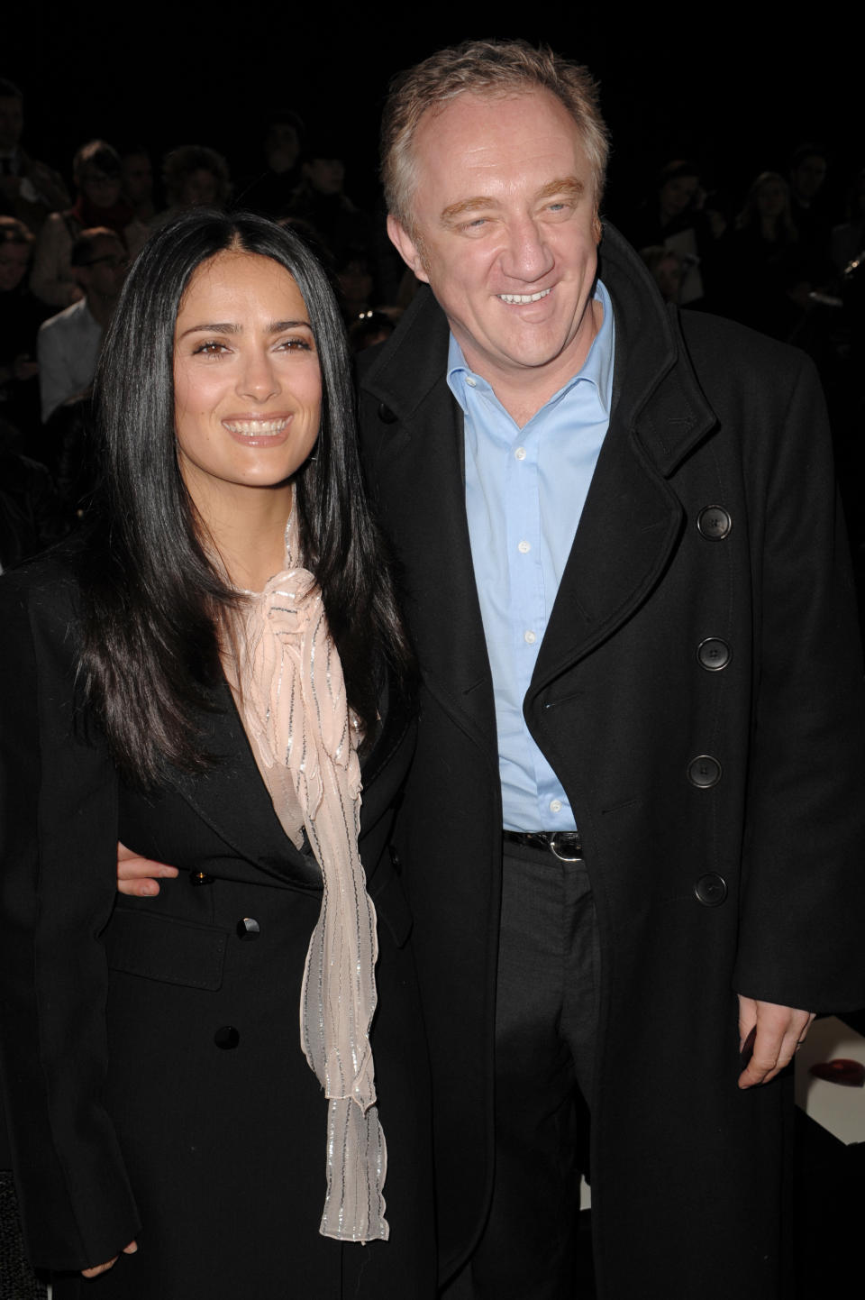 Actress Salma Hayek and Francois-Henri Pinault attend the Stella McCartney Ready-to-Wear Autumn/Winter 2009/2010 fashion show during Paris Fashion Week at Carreau du Temple in Paris. (Photo by Stephane Cardinale/Corbis via Getty Images)