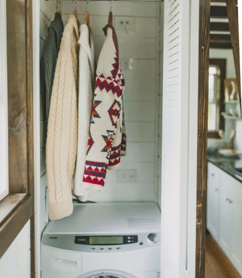 <p>The Spiesses managed to fit a washer and dryer in this 2-foot-wide closet, which still has another 4 square feet of overhead storage space to boot!</p>