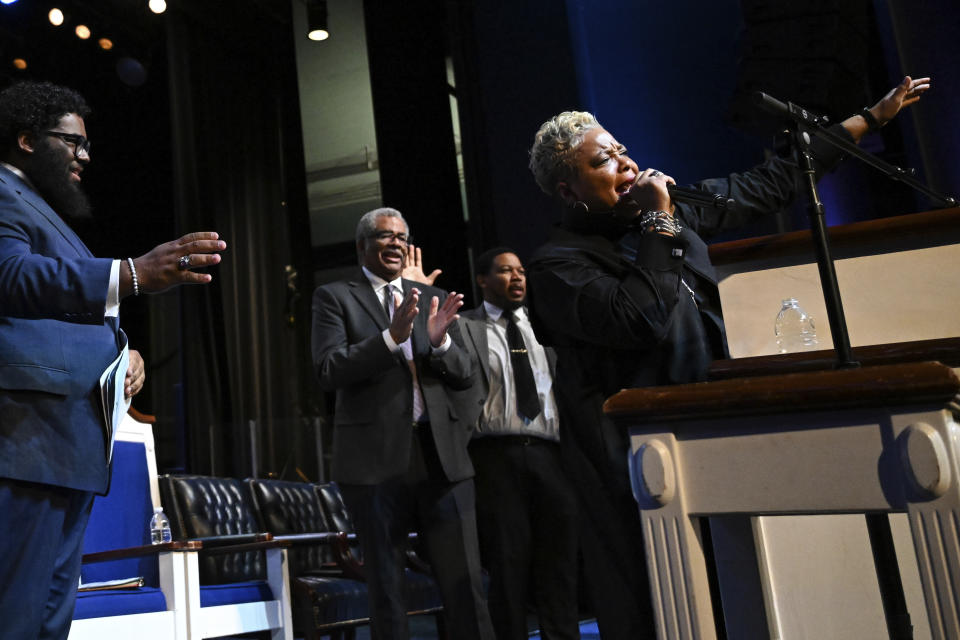 Rev. Gina Stewart, right, preaches during church service at Rankin Chapel, Sunday, April 7, 2024, in Washington. Throughout its long history, the Black Church in America has, for the most part, been a patriarchal institution. Now, more Black women are taking on high-profile leadership roles. But the founder of Women of Color in Ministry estimates that less than one in 10 Black Protestant congregations are led by a woman. “I would hope that we can knock down some of those barriers so that their journey would be just a little bit easier,” said Stewart. (AP Photo/Terrance Williams)