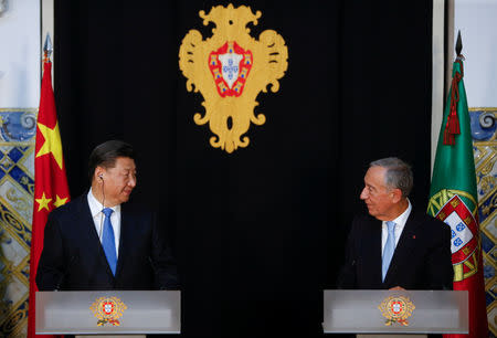 China's President Xi Jinping and Portuguese President Marcelo Rebelo de Sousa hold a news conference in Lisbon, Portugal, December 4, 2018. REUTERS/Pedro Nunes