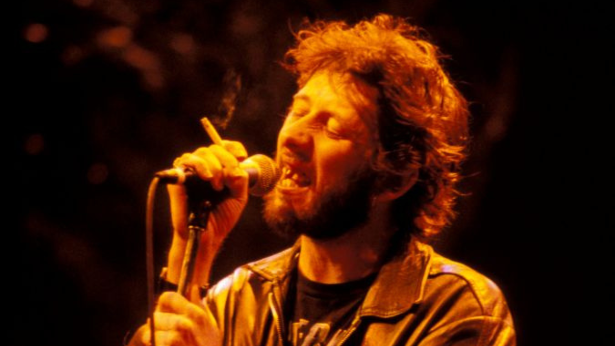  Shane MacGowan performs with The Pogues . 