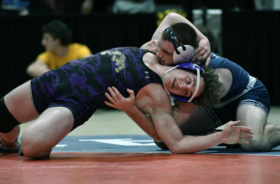 Smithsburg's James Brashears attempts to escape from Manchester Valley's Jake Boog during the 2A-1A championship final at 170 pounds.