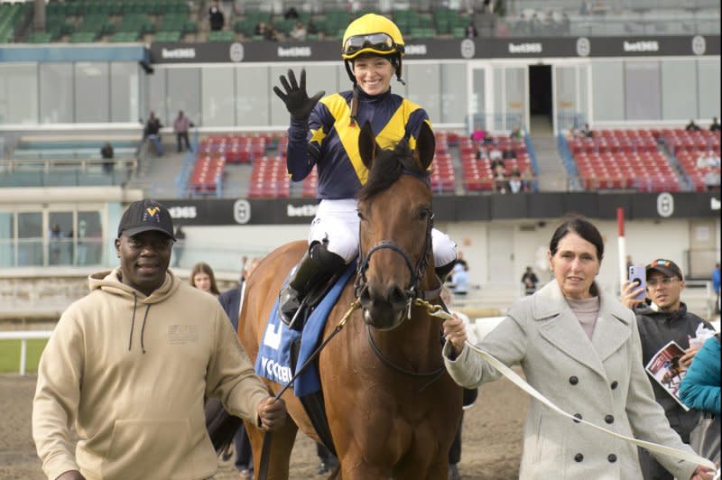 Sofia Vives, last year's champion Canadian apprentice jockey, celebrates a five-win day Saturday at Woodbine, including her first stakes win aboard Sabatini. Photo by Michael Burns, photo courtesy of Woodbine