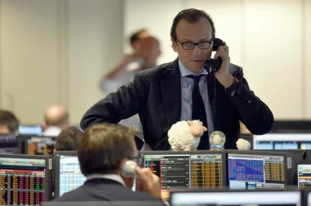 Brokers react on a trading floor at BGC, in the Canary Wharf financial district of London, Britain June 27, 2016. REUTERS/Toby Melville