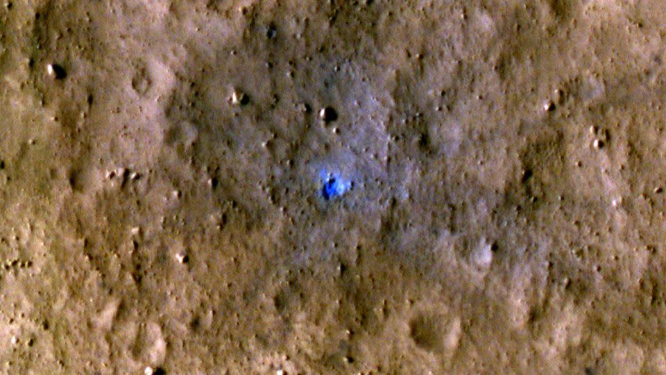 InSight data was compared with photos from orbiters, like this one of an impact crater created on August 30, 2021, to determine when and where meteoroid strikes happen on the Red Planet.  - NASA/JPL-Caltech/University of Arizona