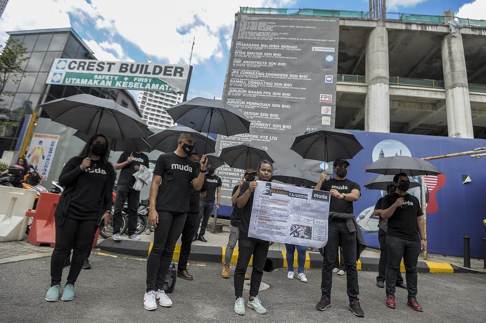 Muda members pose for a photo during a press conference at the Dang Wangi LRT station in Kuala Lumpur, January 5, 2020. — Picture by Shafwan Zaidon