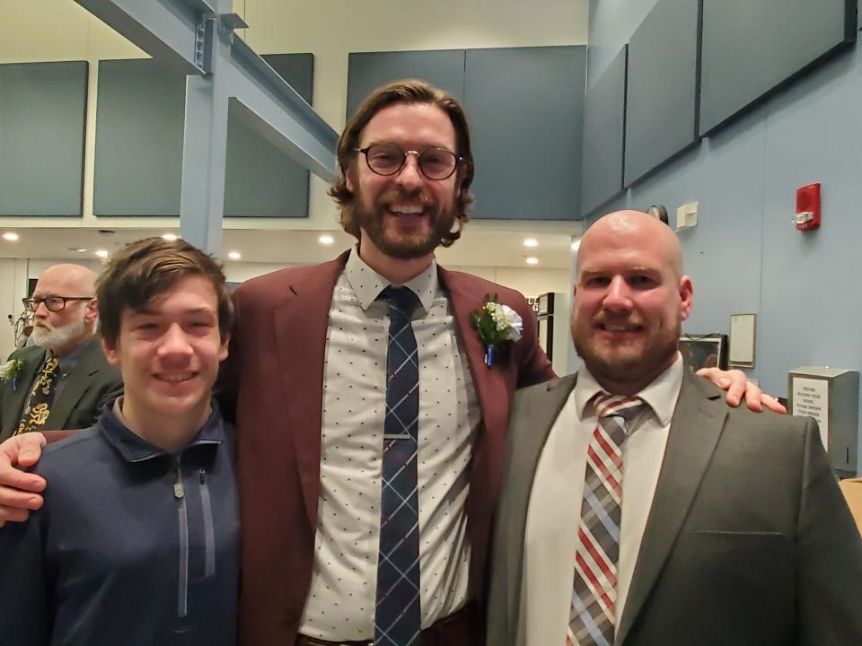 Somersworth Mayor Matt Gerding is seen with his husband Coty Donohue, right, and their foster son, Logan Walker, left, during the city inauguration ceremony Thursday, Jan. 4, 2023 in the Black Box Theater at Somersworth High School's Career Technical Center.