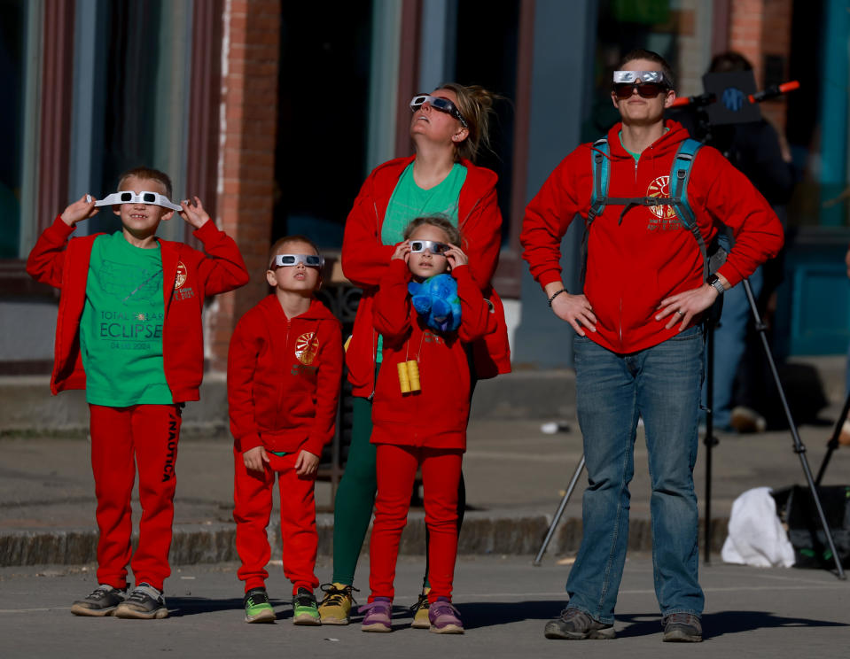 People watch the solar eclipse on April 8, 2024, in Houlton, Maine. / Credit: Joe Raedle/Getty Images