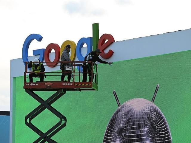 Workers set up a Google display ahead of CES 2023 on 3 January, 2023 at the Las Vegas Convention Center in Las Vegas, Nevada (Getty Images)