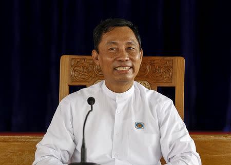 Shwe Mann, speaker of Union Parliament and Lower House of Parliament, smiles during a meeting with locals in his constituency, which he will be contesting in the upcoming general election, at Kanyutkwin, Pyu township, Bago division, Myanmar August 22, 2015 file photo. REUTERS/Soe Zeya Tun/Files