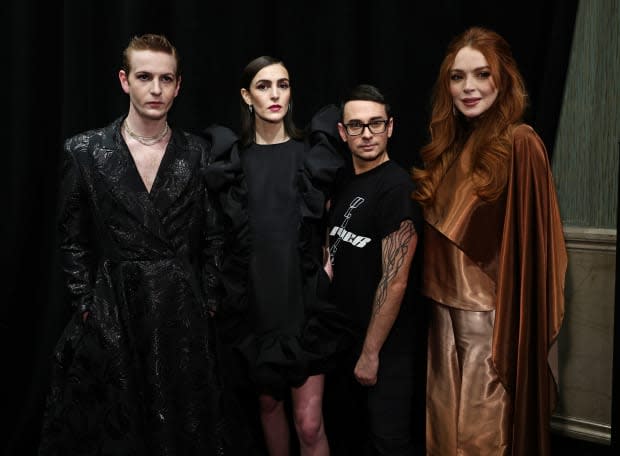 NEW YORK, NEW YORK - FEBRUARY 09: (L-R) Dakota Lohan, Ali Lohan, Christian Siriano and Lindsay Lohan attend the Christian Siriano Fall/Winter 2023 NYFW Show at Gotham Hall on <a href="https://parade.com/living/february-holidays-observances" rel="nofollow noopener" target="_blank" data-ylk="slk:February;elm:context_link;itc:0;sec:content-canvas" class="link ">February</a> 09, 2023 in New York City. (Photo by Jamie McCarthy/Getty Images for Christian Siriano)<p><a href="https://www.gettyimages.com/detail/1464614718" rel="nofollow noopener" target="_blank" data-ylk="slk:Jamie McCarthy/Getty Images;elm:context_link;itc:0;sec:content-canvas" class="link ">Jamie McCarthy/Getty Images</a></p>