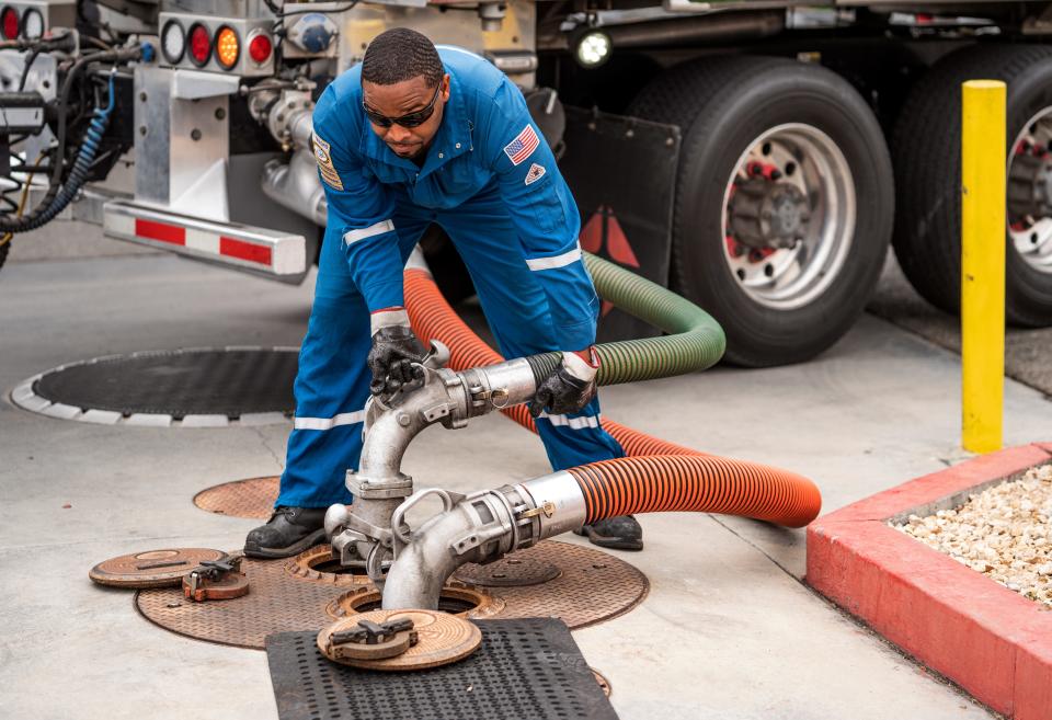 A gas tank driver delivers 8,500 gallons of gasoline at an ARCO gas station in Riverside, Calif., Saturday, May 28, 2022. Gas prices halted their sharp rise just in time for Memorial Day weekend, and analysts said the record-high prices weren't expected to keep travelers from taking to the road.