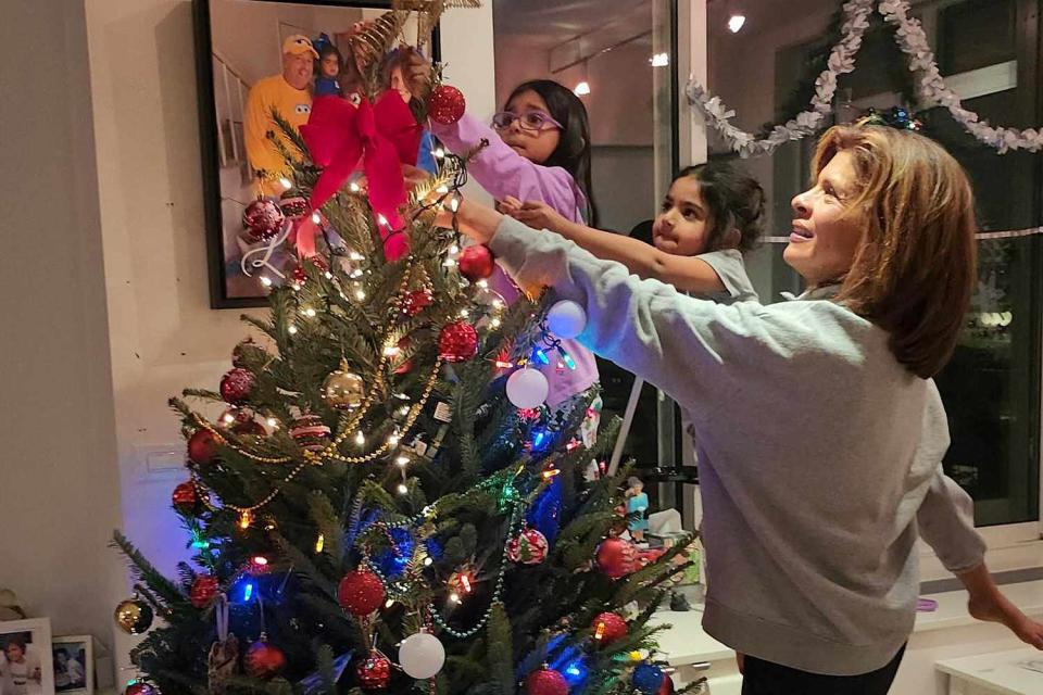 <p>hoda kotb/instagram</p> Hoda Kotb decorate the Christmas tree with her two daughters 