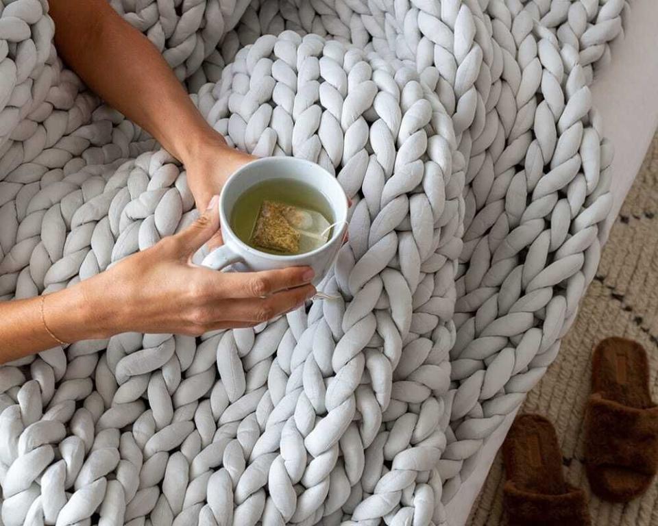 Hand-knit from super breathable bamboo fabric, this chunky weighted blanket will be an eye-catching addition to your living room or bedroom. It weighs 10 pounds, is 42 inches by 65 inches and comes in four dreamy colors. Promising review: 