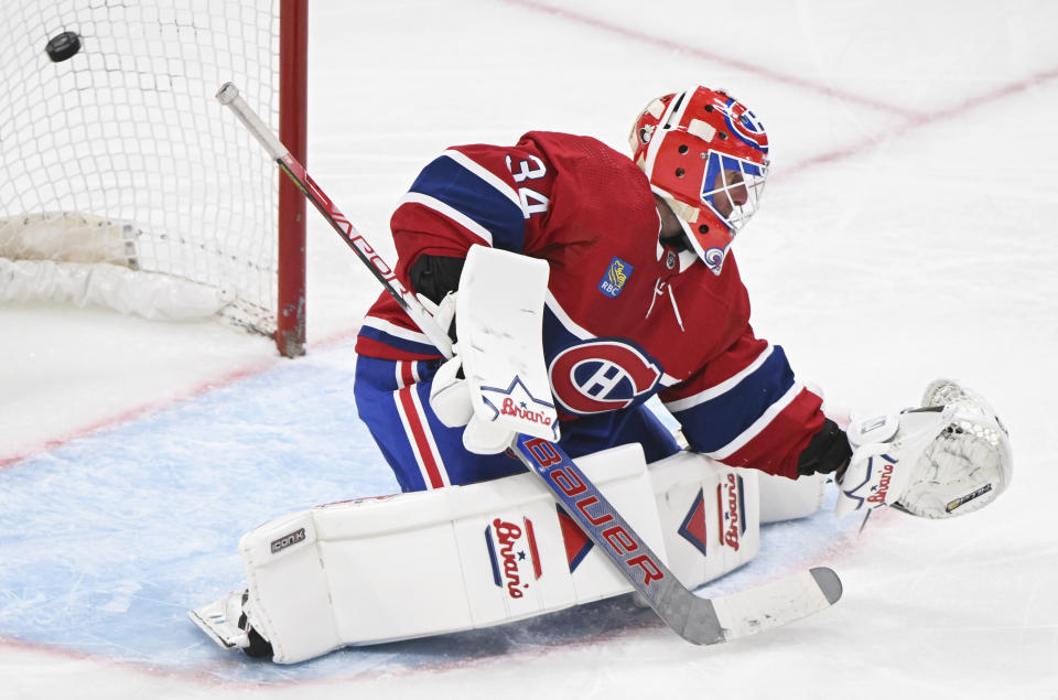 Montreal Canadiens goaltender Jake Allen gives up a goal to Ottawa Senators' Shane Pinto during the second period of an NHL hockey game in Montreal, Tuesday, Jan. 23, 2024. (Graham Hughes/The Canadian Press via AP)