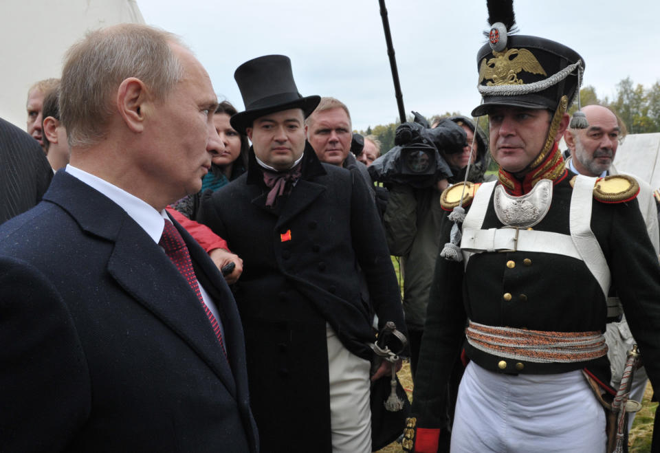 Russia's President Vladimir Putin attends a staged battle re-enactment to mark the 200th anniversary of the battle of Borodino, in Borodino, about 110 km (70 miles) west of Moscow, Sunday, Sept. 2, 2012. The Battle of Borodino in 1812 was the largest and bloodiest single-day action of the French invasion of Russia. (AP Photo/RIA-Novosti, Alexei Nikolsky, Presidential Press Service)