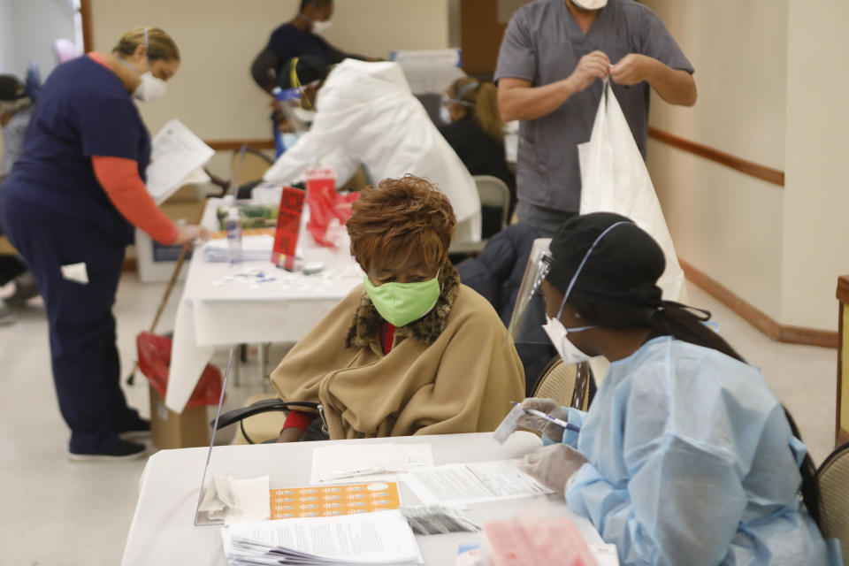 Residents receive the COVID-19 vaccine at St. Johns Missionary Baptist Church on January 10, 2021 in Tampa, Florida. (Octavio Jones/Getty Images)