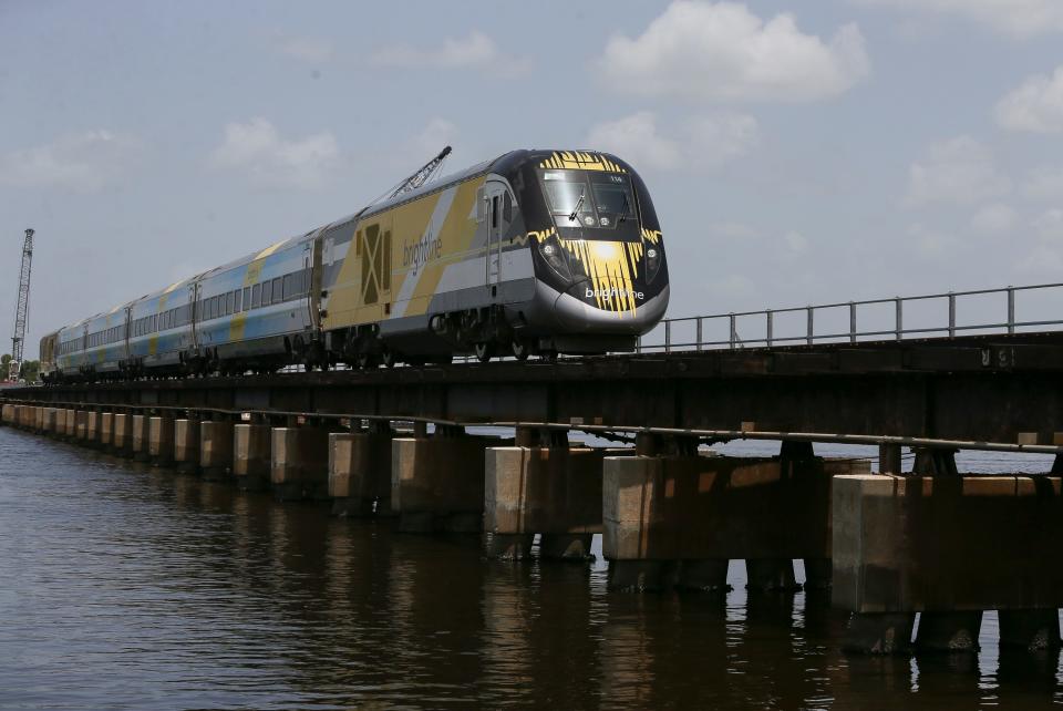 Brightline crosses the St. Lucie River railroad bridge during train testing in the area, Friday, July 21, 2023, in downtown Stuart.