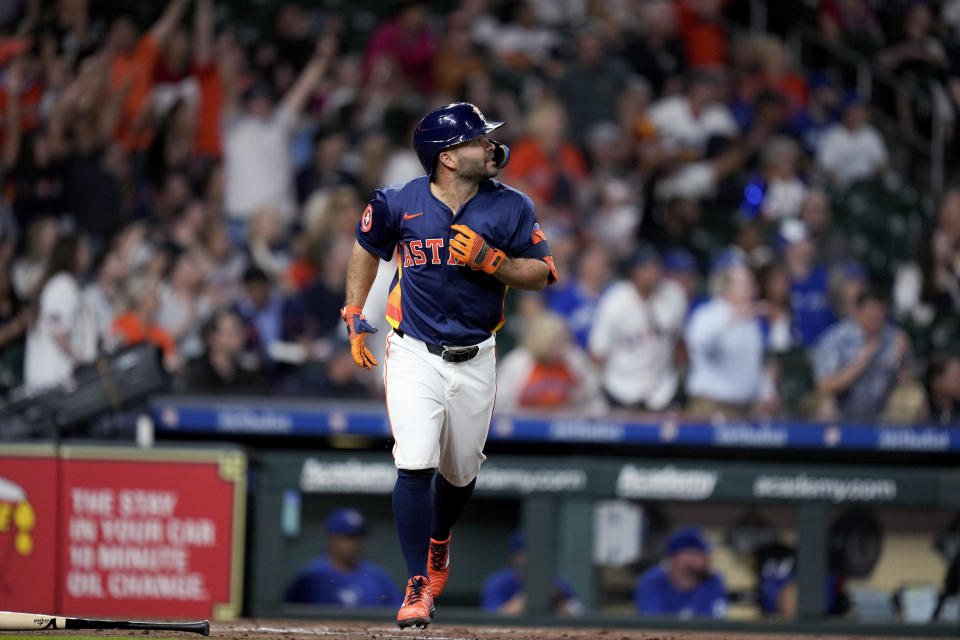 Houston Astros' Jose Altuve watches his solo home run against the Toronto Blue Jays during the fourth inning of a baseball game Tuesday, April 2, 2024, in Houston. (AP Photo/Eric Christian Smith)