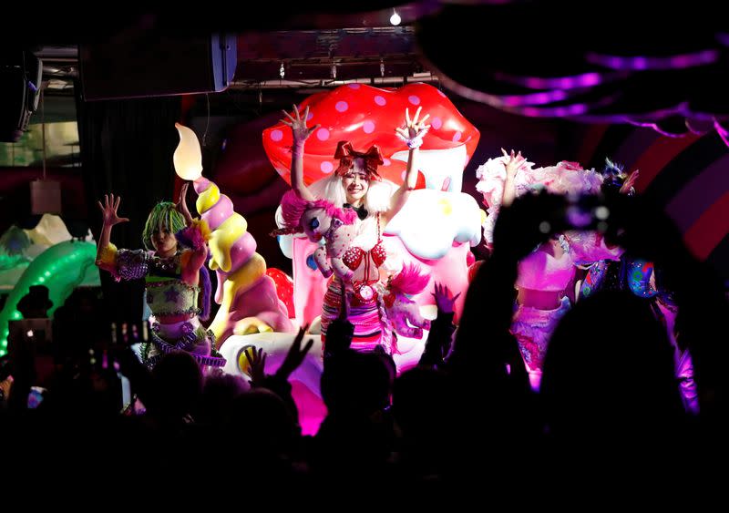 Staff members of Kawaii Monster Cafe called 'Monster Girls' perform on the stage at the cafe amid the coronavirus disease (COVID-19) outbreak, in Tokyo