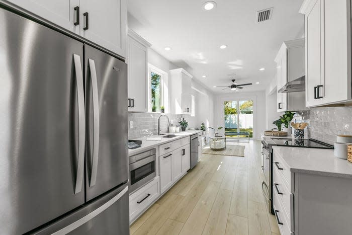 The kitchen in a skinny house.