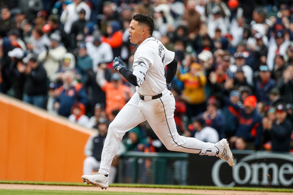 Detroit Tigers third base Gio Urshela (13) runs after batting a double against Oakland Athletics during the eighth inning of the home opening day at Comerica Park in Detroit on Friday, April 5, 2024.