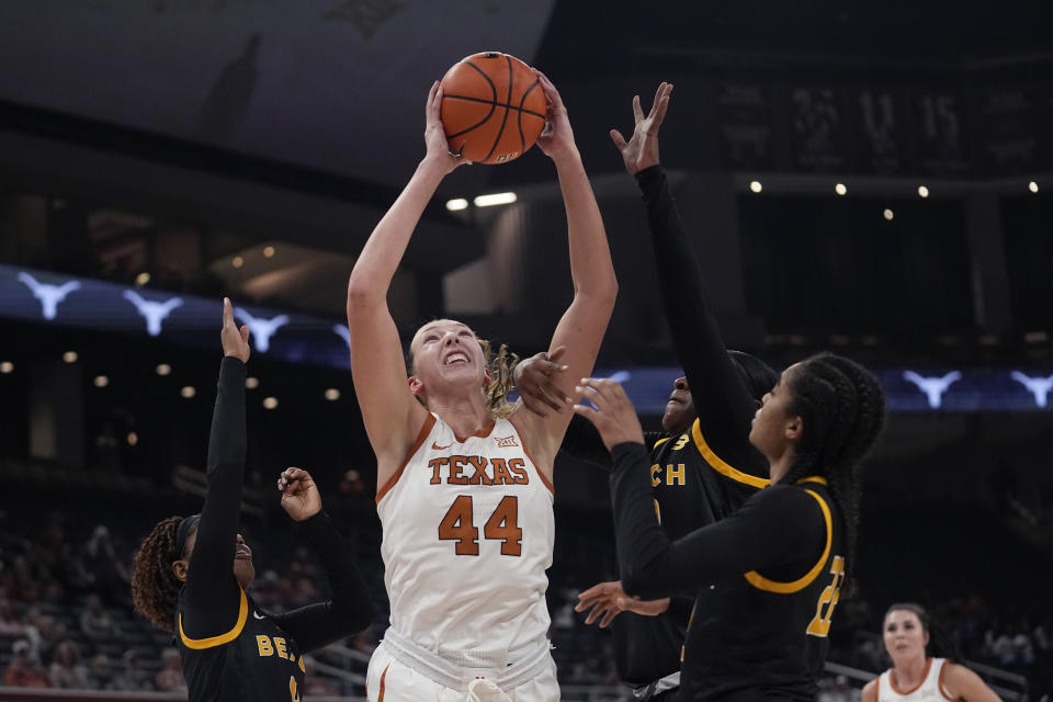 Texas forward Taylor Jones (44) grabs a rebound against Long Beach State during the second half of an NCAA college basketball game in Austin, Texas, Wednesday, Dec. 6, 2023. (AP Photo/Eric Gay)