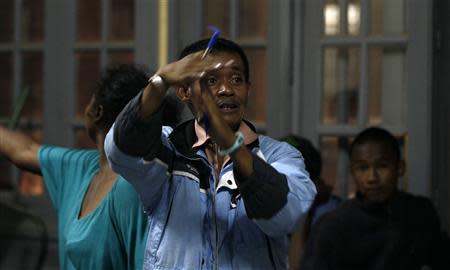 A polling agent calls for a break as they count votes at a polling centre in Madagascar's capital Antananarivo, December 20, 2013. REUTERS/Thomas Mukoya