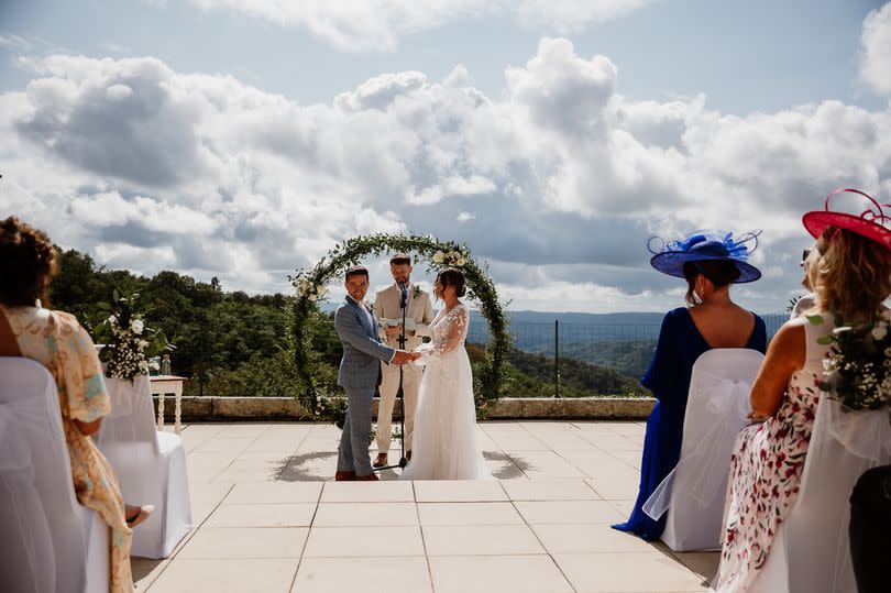 The gorgeous couple married in an outdoor ceremony in front of 70 friends