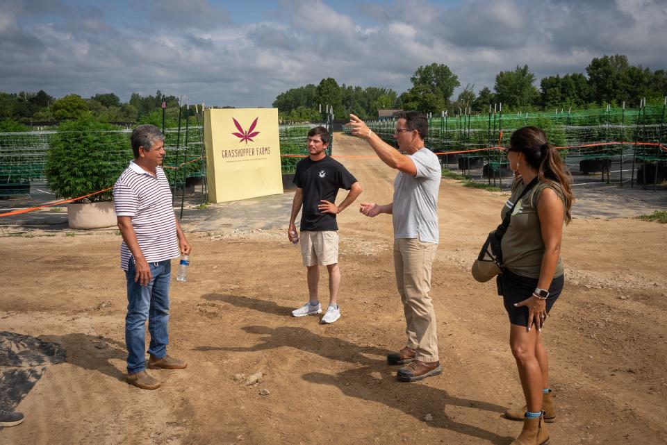 Grasshopper Farms Founder and CEO Will Bowden explains the cannabis cultivation process at the farm's third annual open house on Aug. 26, 2023. More than 200 people attended the open house at the Paw Paw farm.