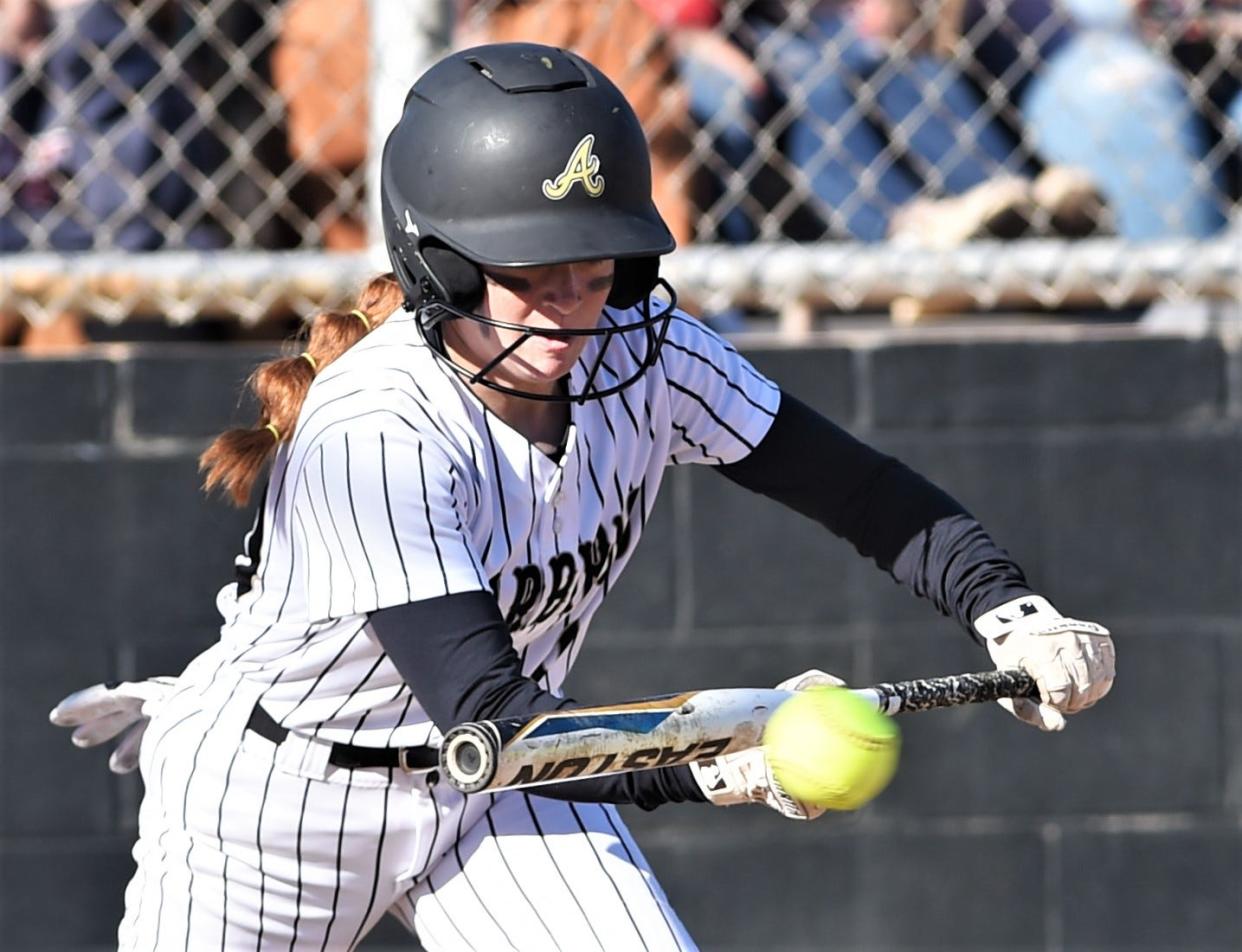 Abilene High's Kinzley Cantu bunts for a hit in the fifth inning against Midland Legacy. She also hit a solo homer later in the game on March 12 at the AHS softball field.