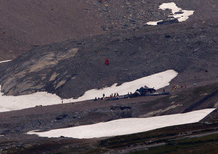 A general view of the accident site of a Junkers Ju-52 airplane of the local airline JU-AIR, in 2,450 meters (8,038 feet) above sea level near the mountain resort of Flims, Switzerland August 5, 2018. REUTERS/Arnd Wiegmann