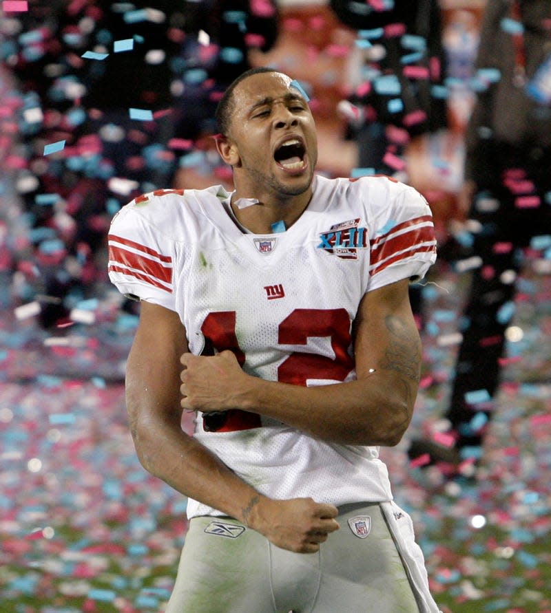 New York Giants receiver Steve Smith (12) celebrates after the Giants beat the New England Patriots 17-14 in the Super Bowl XLII football game on Sunday, Feb. 3, 2008, in Glendale, Ariz. (AP Photo/Matt Slocum)