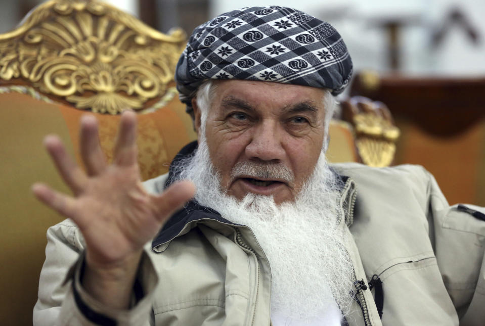 Former Afghan cabinet Minister Ismail Khan, speaks during an interview with the Associated Press in Herat province, western of, Afghanistan, Wednesday, Feb. 20, 2019. A powerful political leader, who was previously tapped by some to lead Afghanistan’s negotiating team with the Taliban, warned Afghanistan’s president Wednesday against squandering an opportunity to find a peaceful settlement to the country’s latest war that is now into its 18th year. (AP Photo/Rahmat Gul)