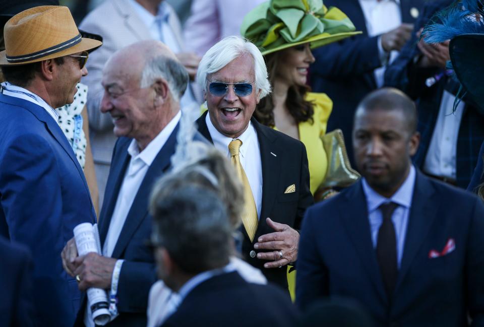 Trainer Bob Baffert reacts in the Winner's Circle after Medina Spirit won the 147th Kentucky Derby Saturday. May 1, 2021