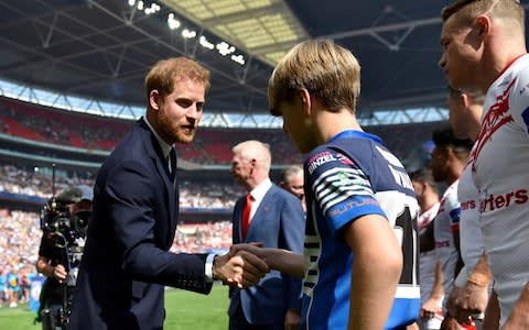 Prince Harry before the Challenge Cup Final.  - Credit: ADAM HOLT/Action Images via Reuters